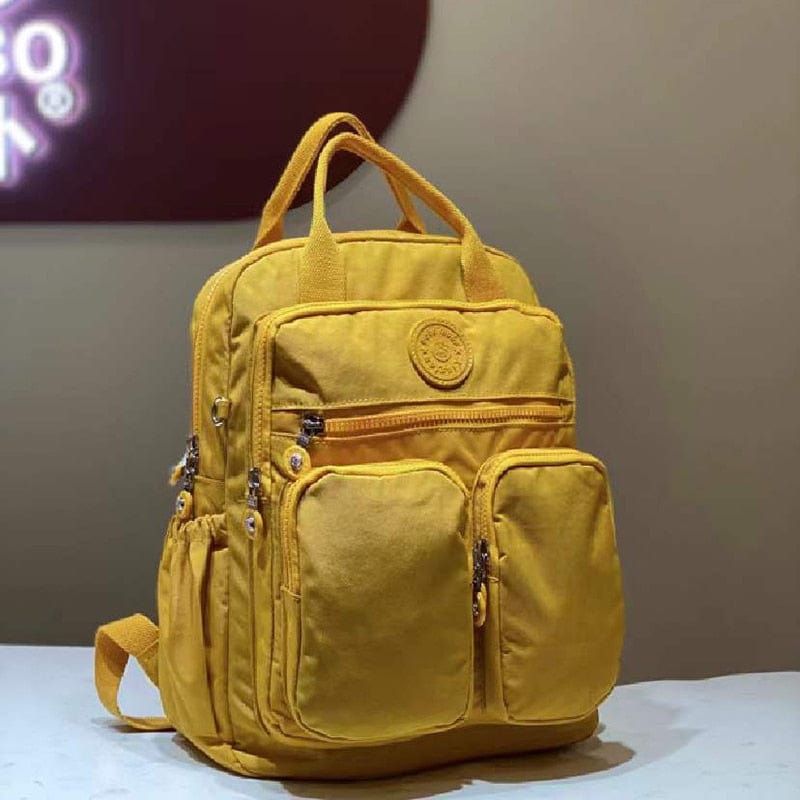 KUMA Stationery & Crafts  Yellow New Essentials Backpack; many colors to choose from 🎒